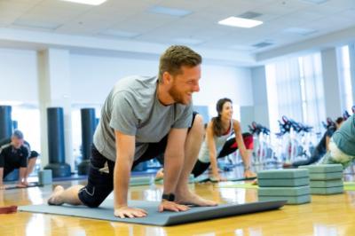 Member in a yoga class